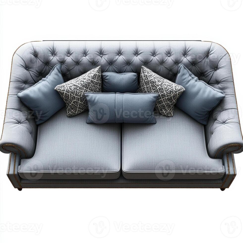 Luxurious grey sofa with tufted design and decorative pillows, perfect for modern living spaces photo