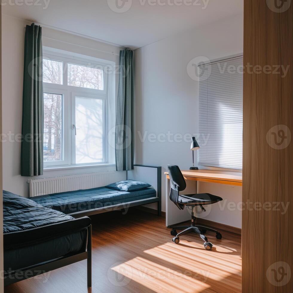 bright and modern single bedroom featuring bed, desk, and chair. Natural light streams through window, creating warm and inviting atmosphere photo