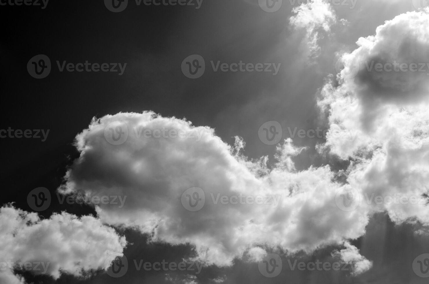 Sky with clouds in sun rays photo