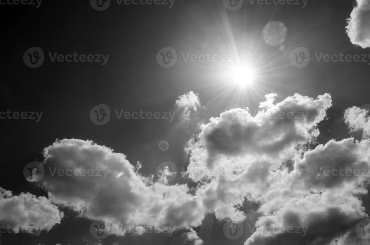 Sky with clouds in sun rays photo