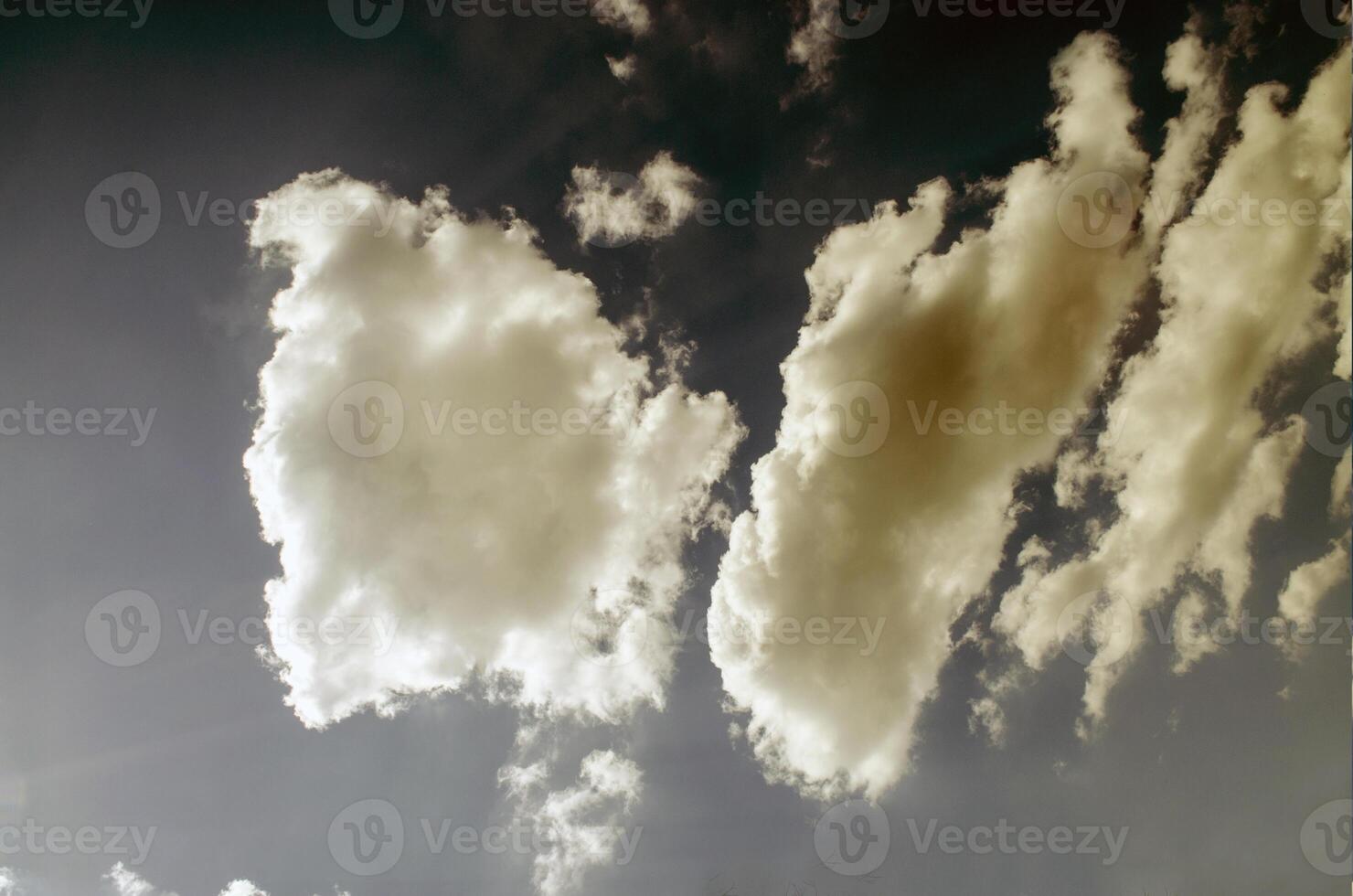 Sky with clouds in sun rays photo