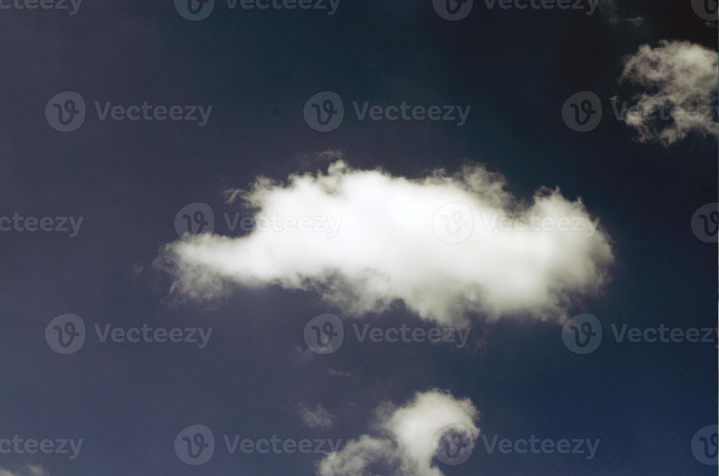 Sky with clouds in sun rays photo