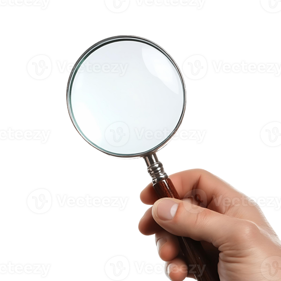 A hand holding a magnifying glass png