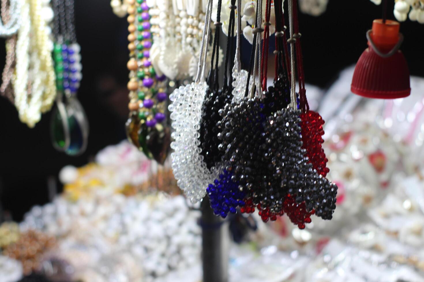 A display of necklaces and other jewelry photo