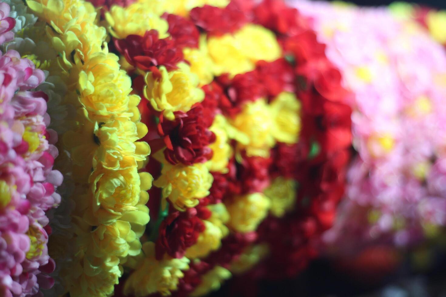 A spiral of flowers and a tube. Flower crowns are a chic and cheery way to complete the perfect ensemble for a wedding. photo