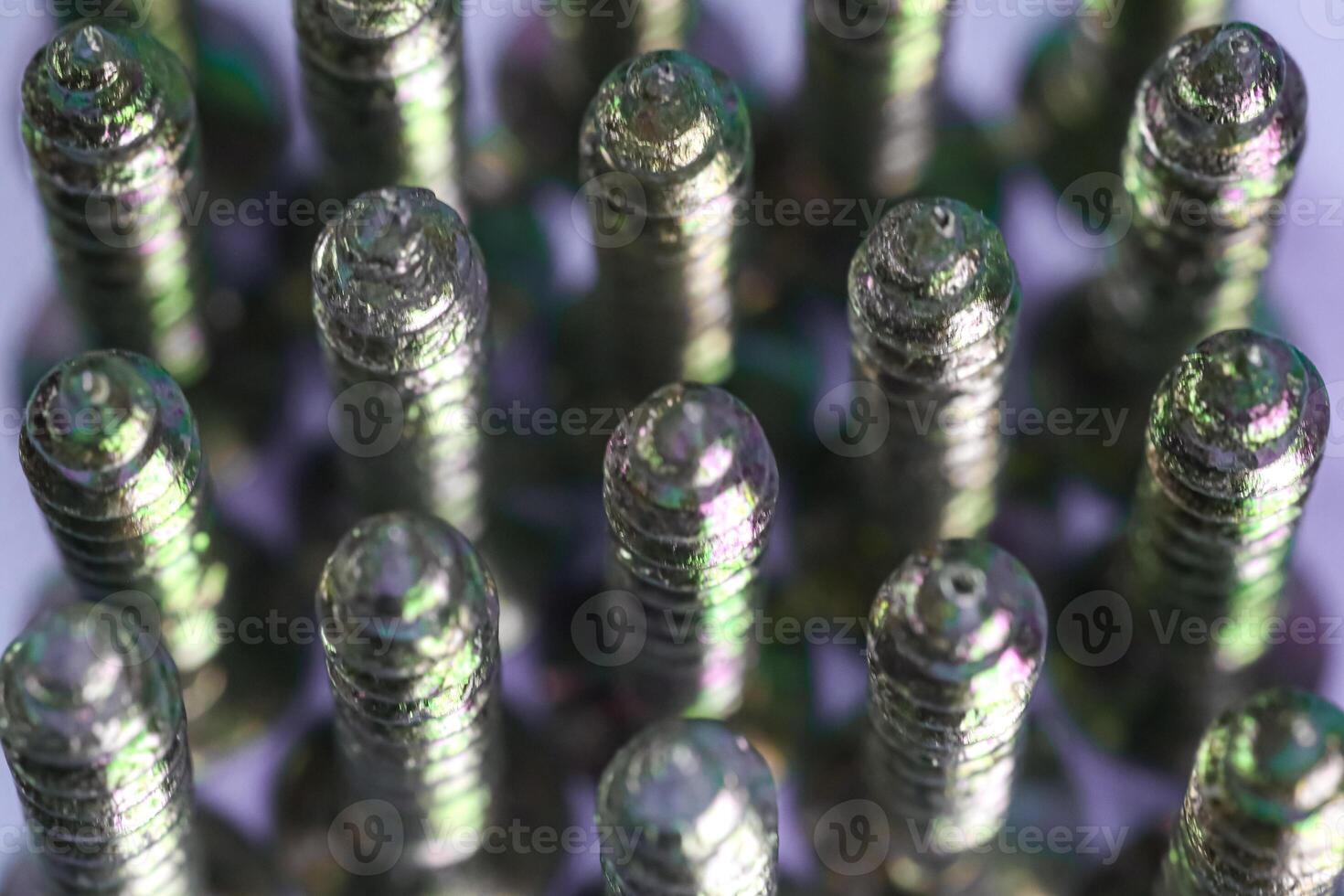 row of screw tips taken with macro shot photo