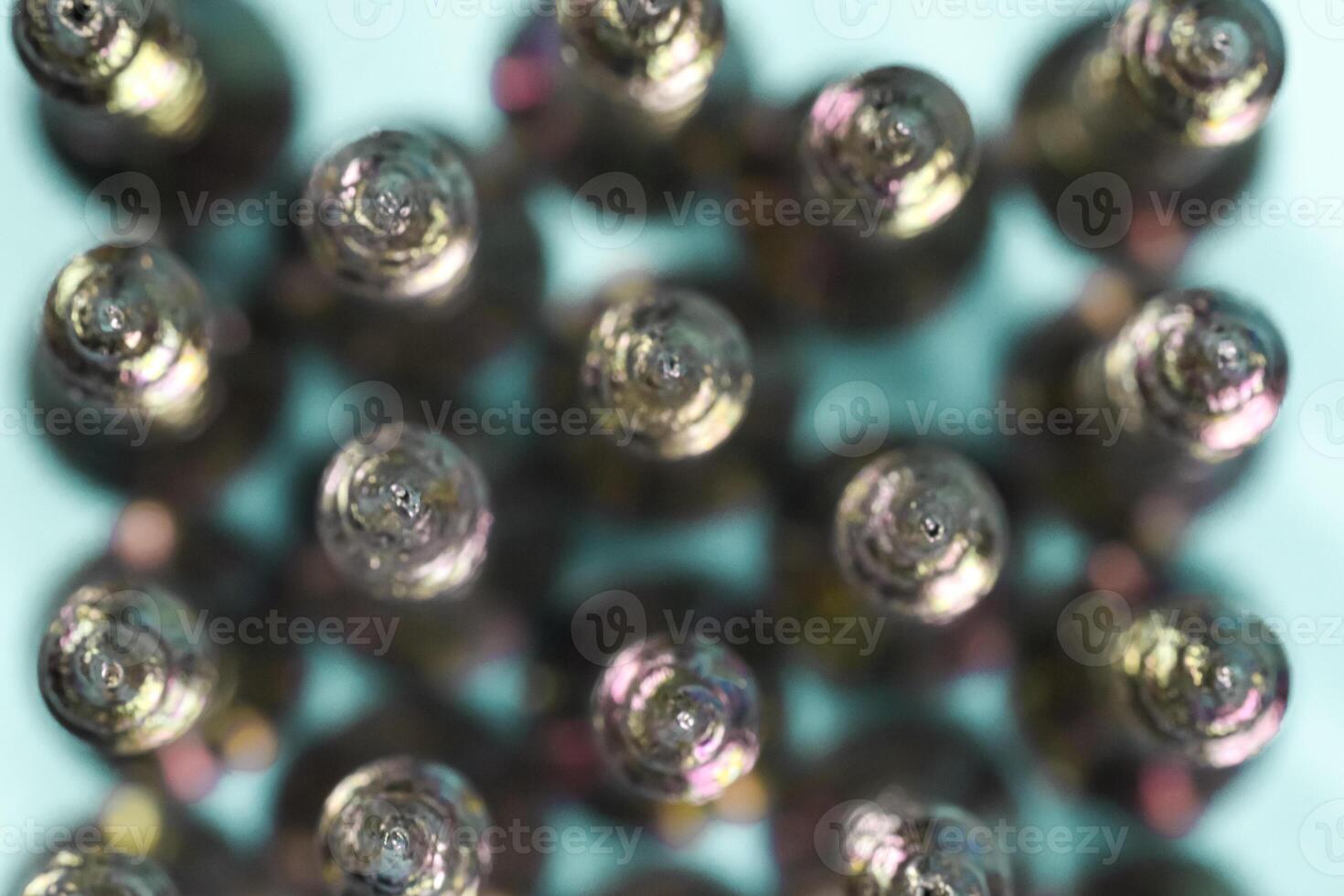 top view of row of screw tips taken with macro shot photo
