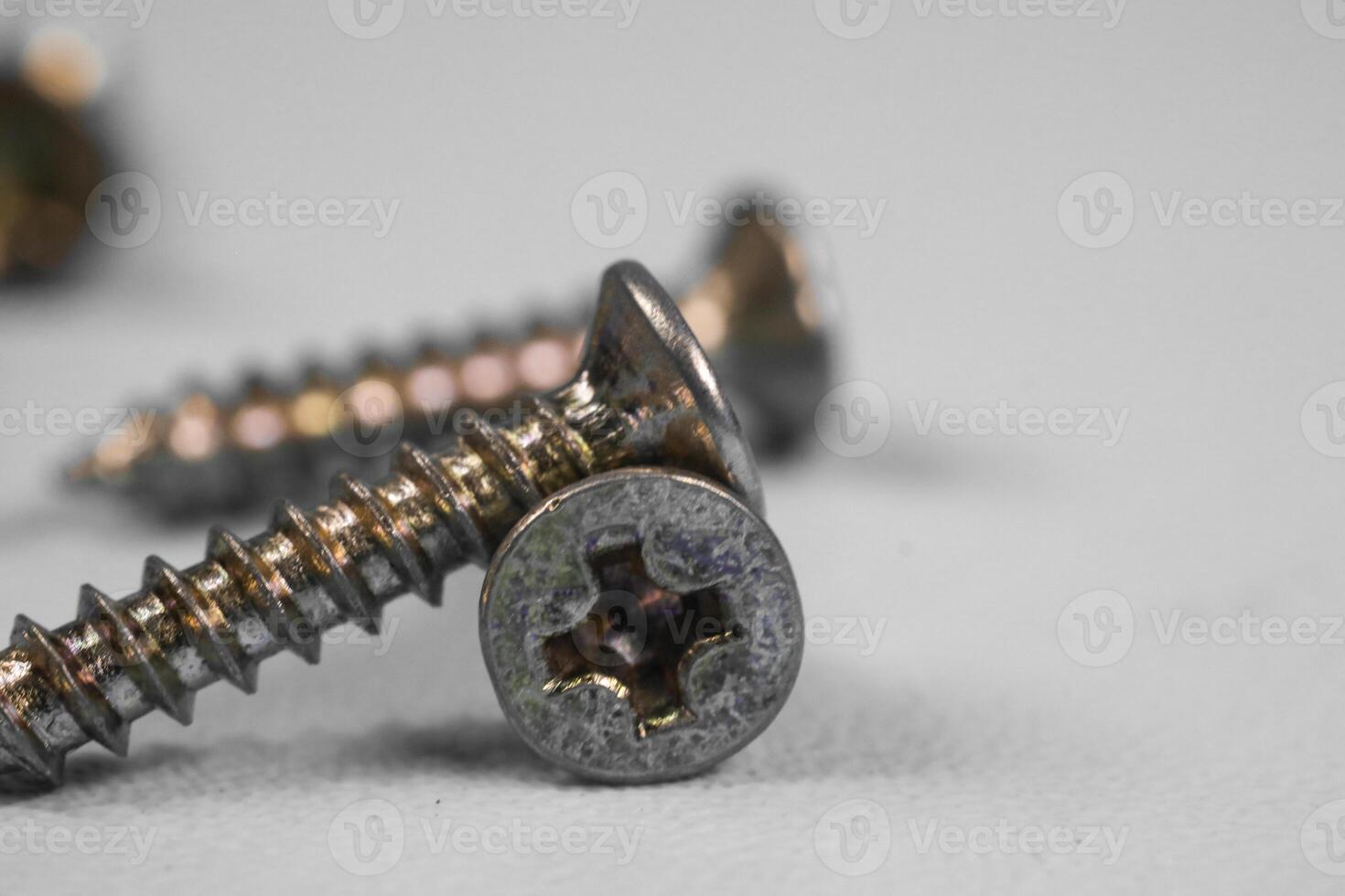 screw close up isolated on white background photo