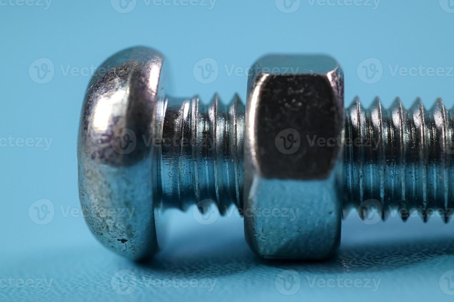 close up set of nut and bolts photo