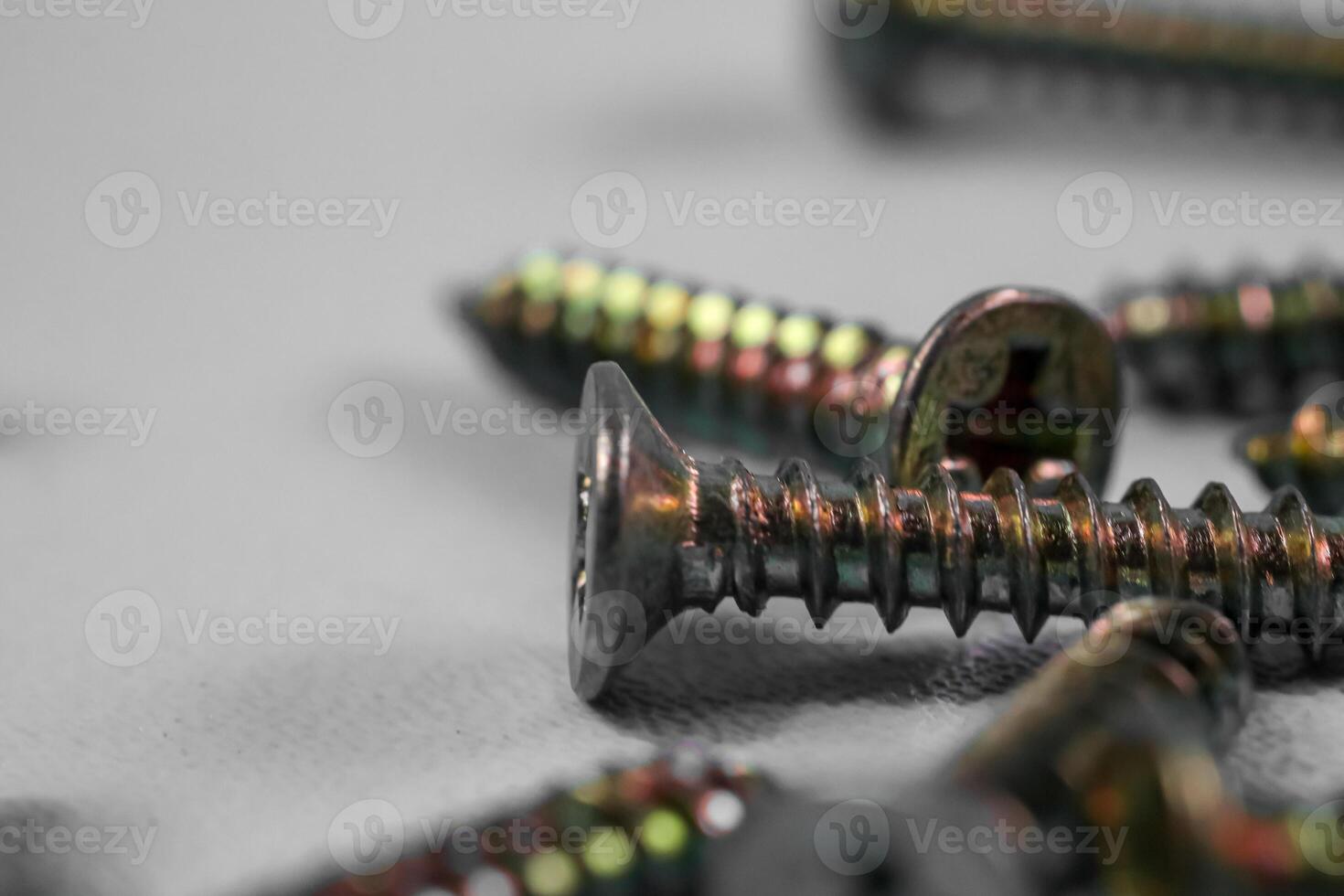screw close up isolated on white background photo