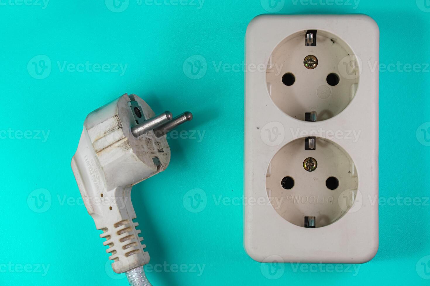 ocket and plug isolated on green photo