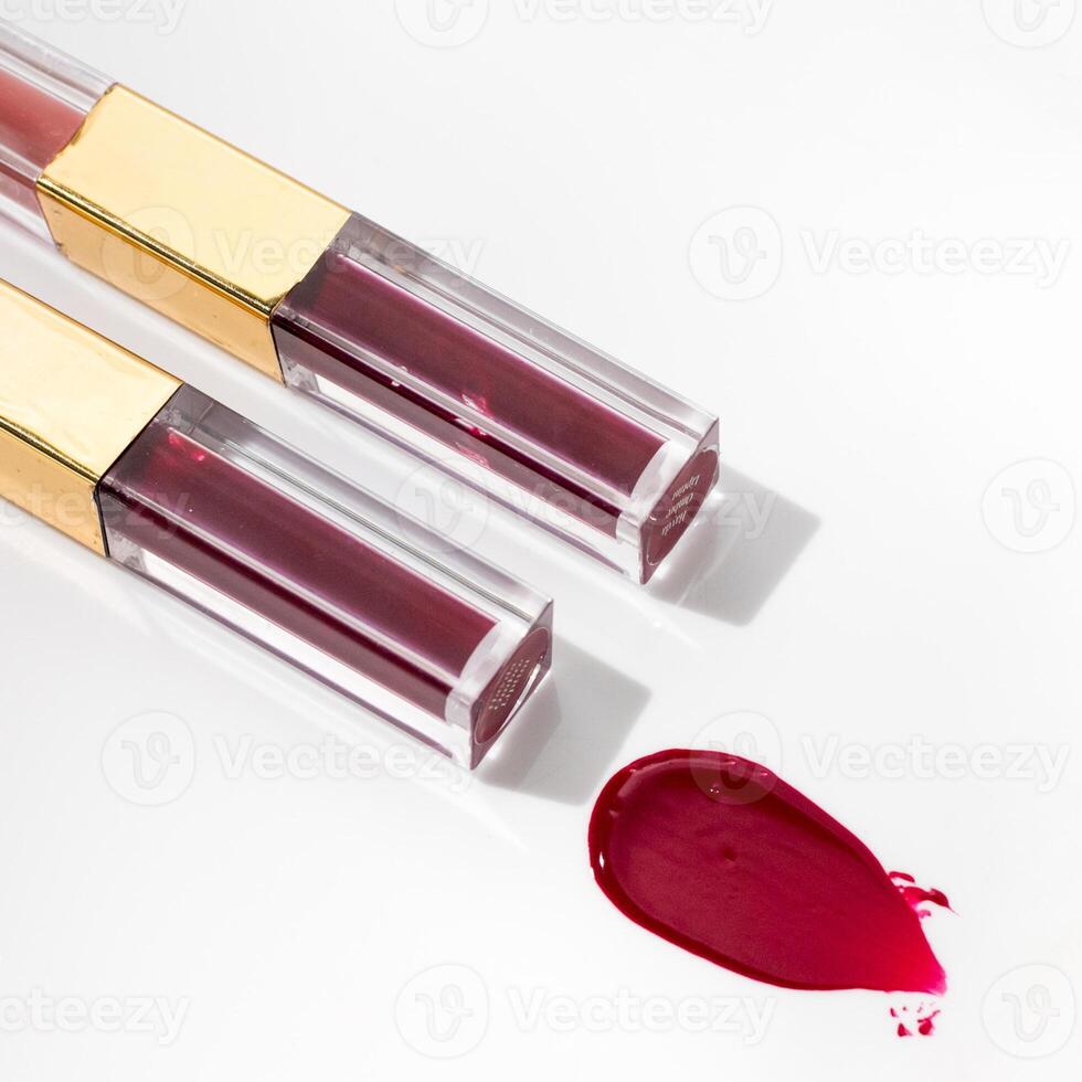 Lip gloss in red and gold photo