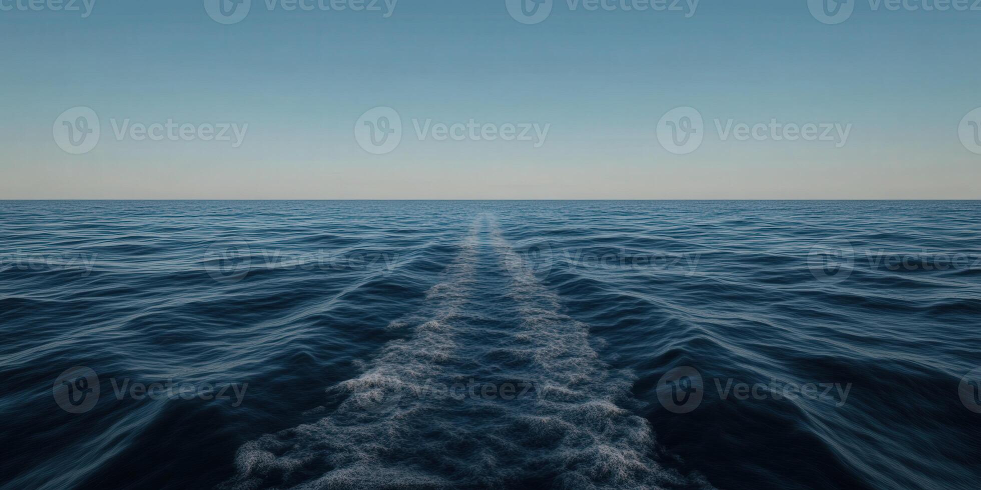 Endless ocean view with gentle waves and clear blue sky photo