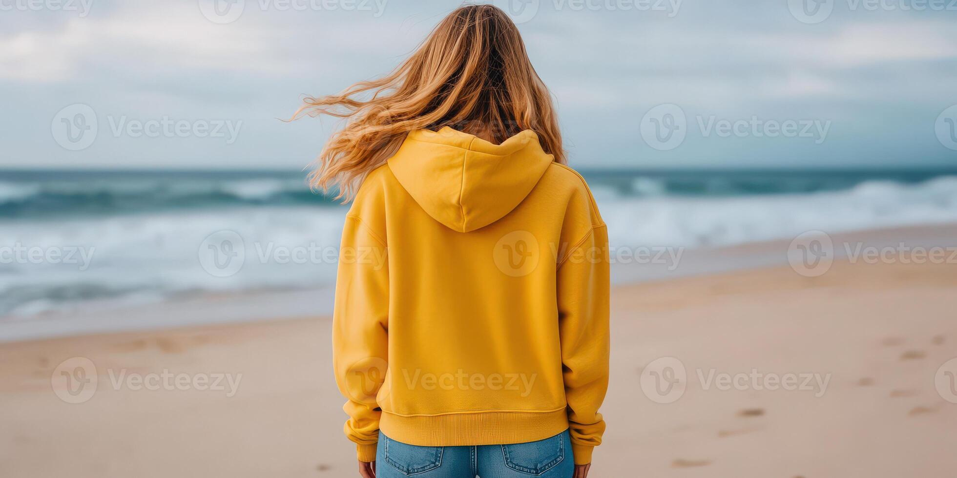 Walking along the beach with golden waves crashing nearby photo