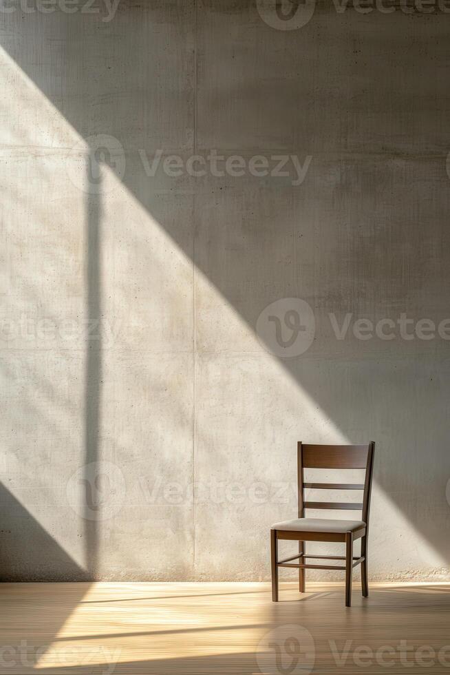 A wooden chair illuminated by sunlight in a minimalist room photo