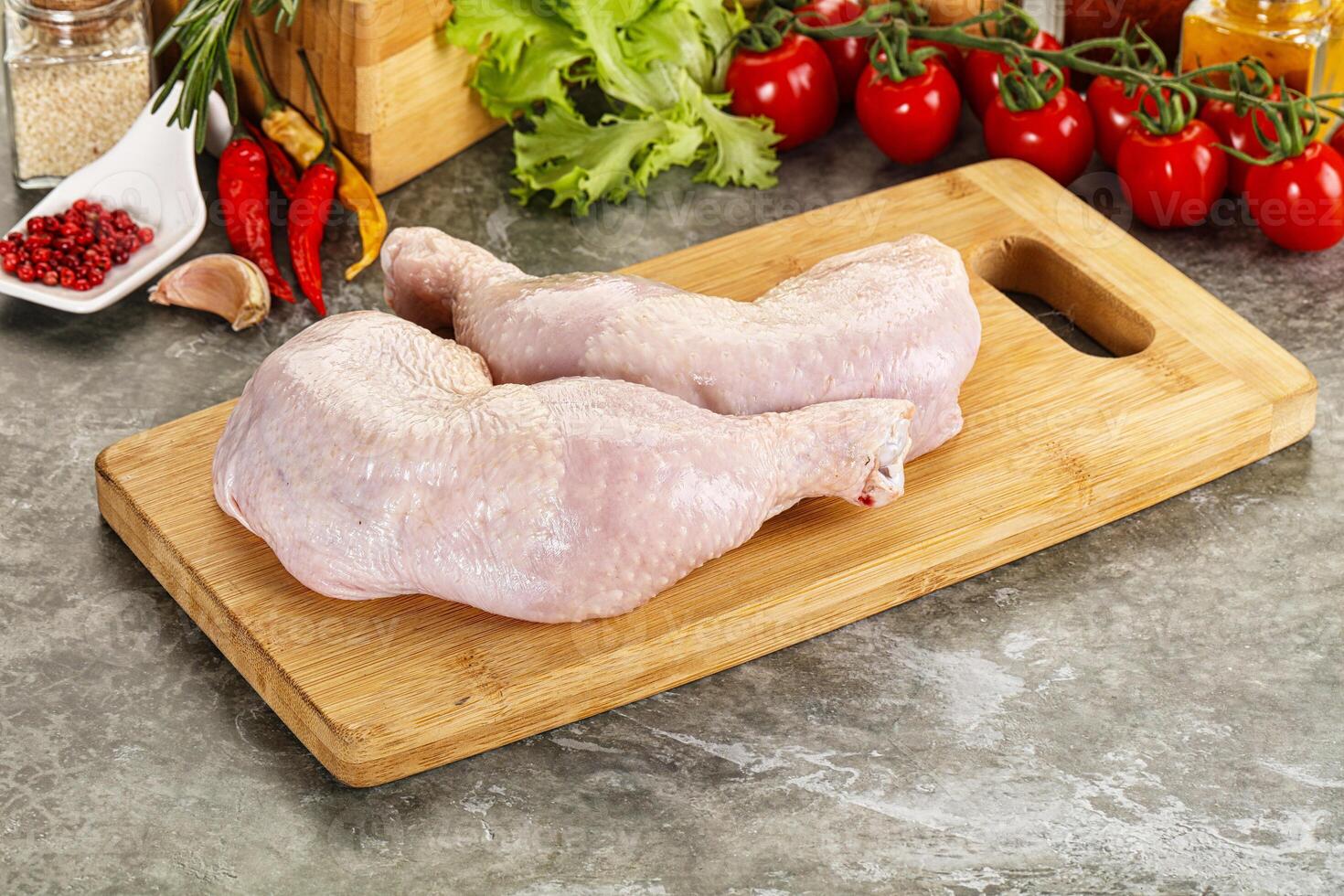 Raw chicken leg foe cooking photo