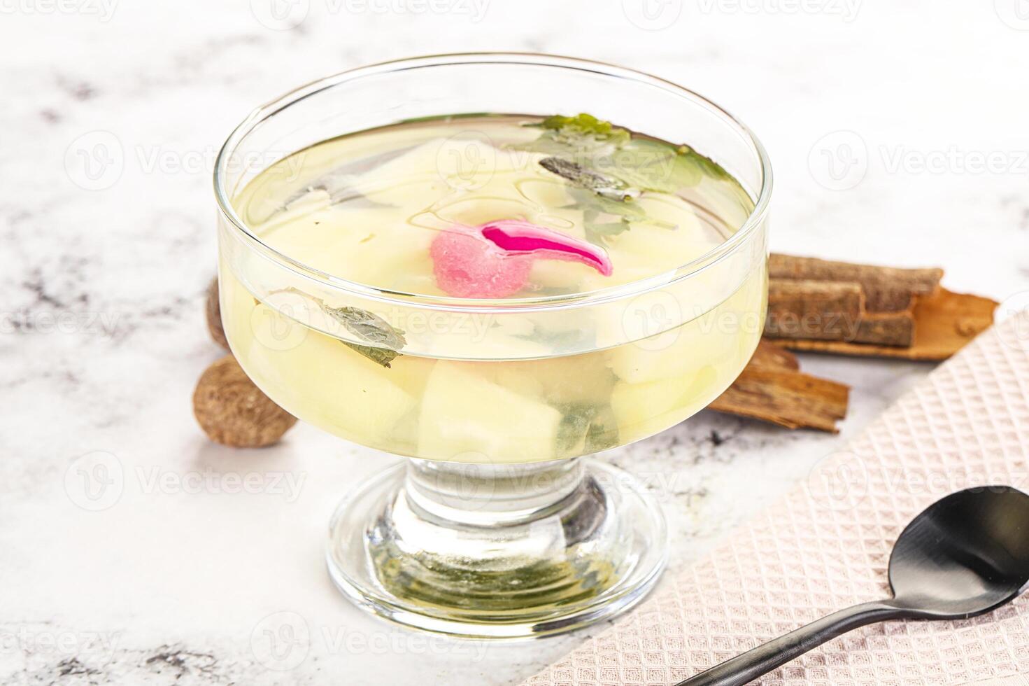 Sweet pineapple jelly with mint photo