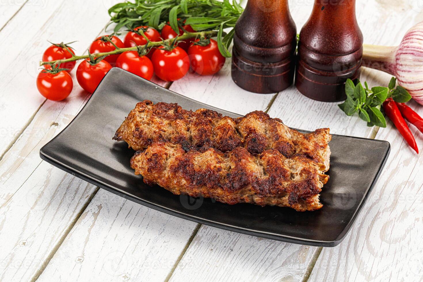 Chicken kebab minced meat and spices photo