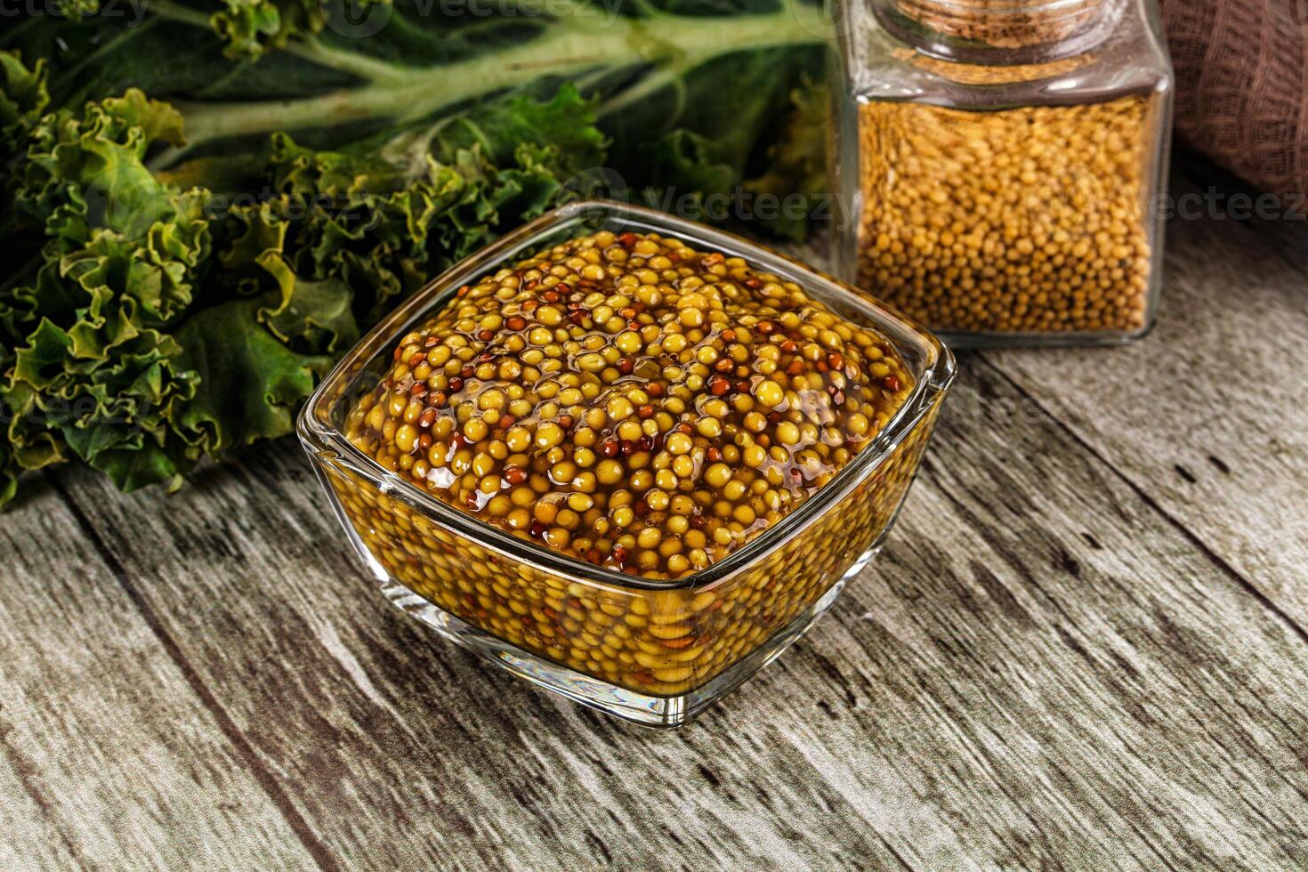 Mustard sauce with seeds in the bowl photo