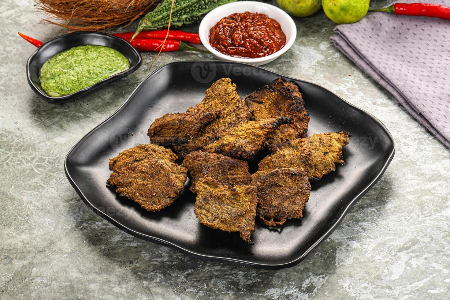 Grilled beef barbecue with spises photo