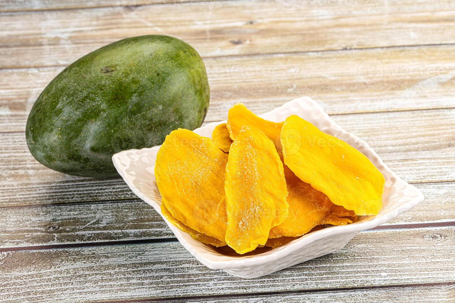 Dry sweet yellow mango snack photo