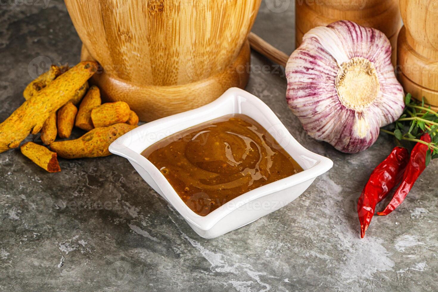 Indian curry sauce in the bowl photo