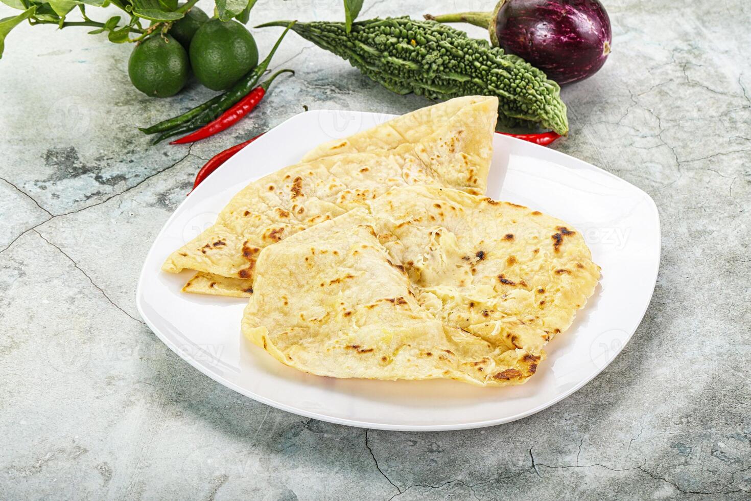 Indian tandori bread - naan with cheese photo