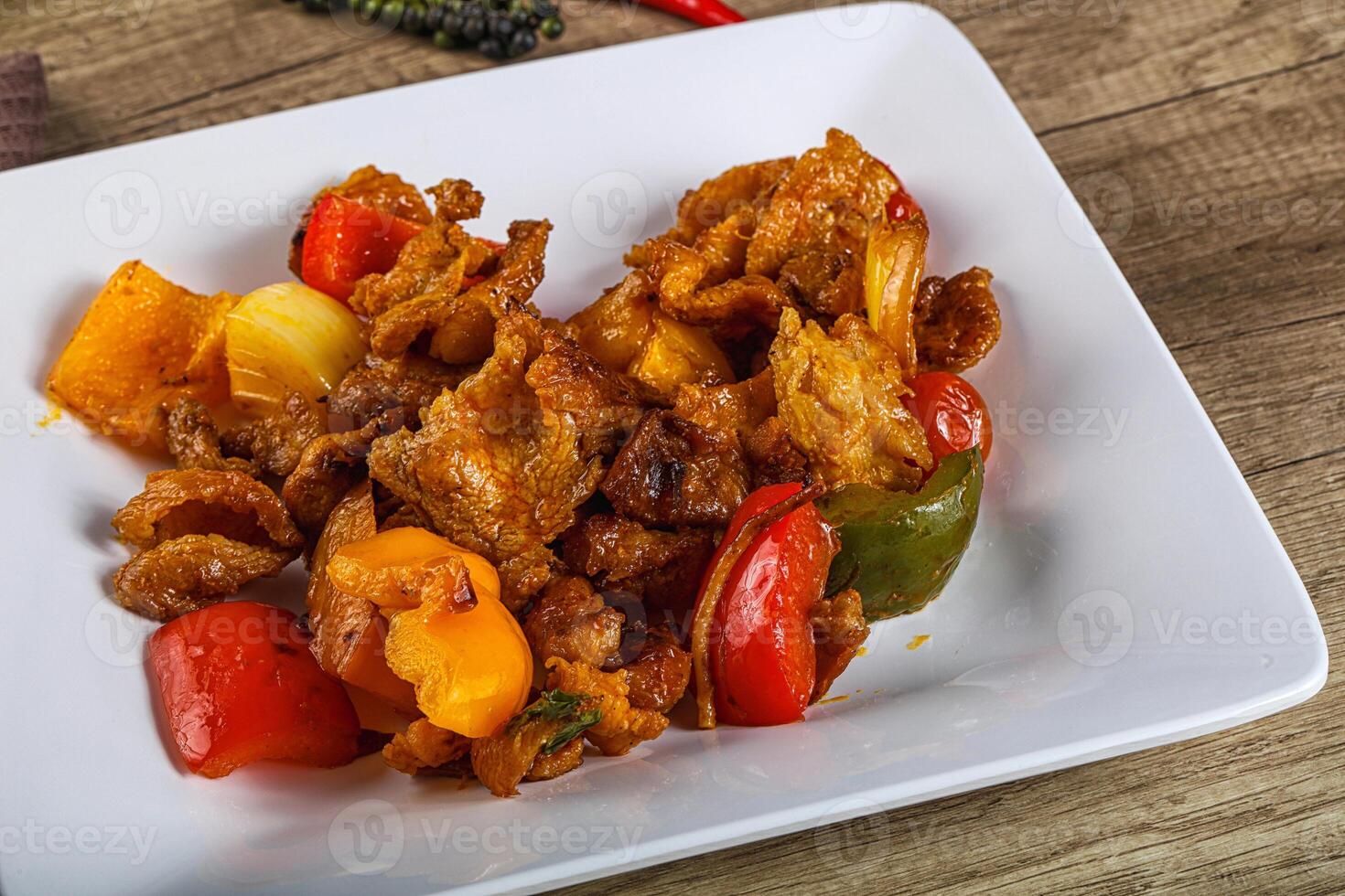 Asian cuisine - roasted crocodile meat photo