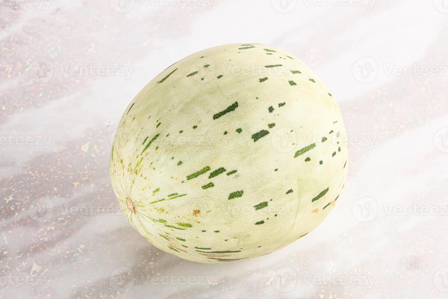 Ripe sweet juicy Dalmatin melon photo