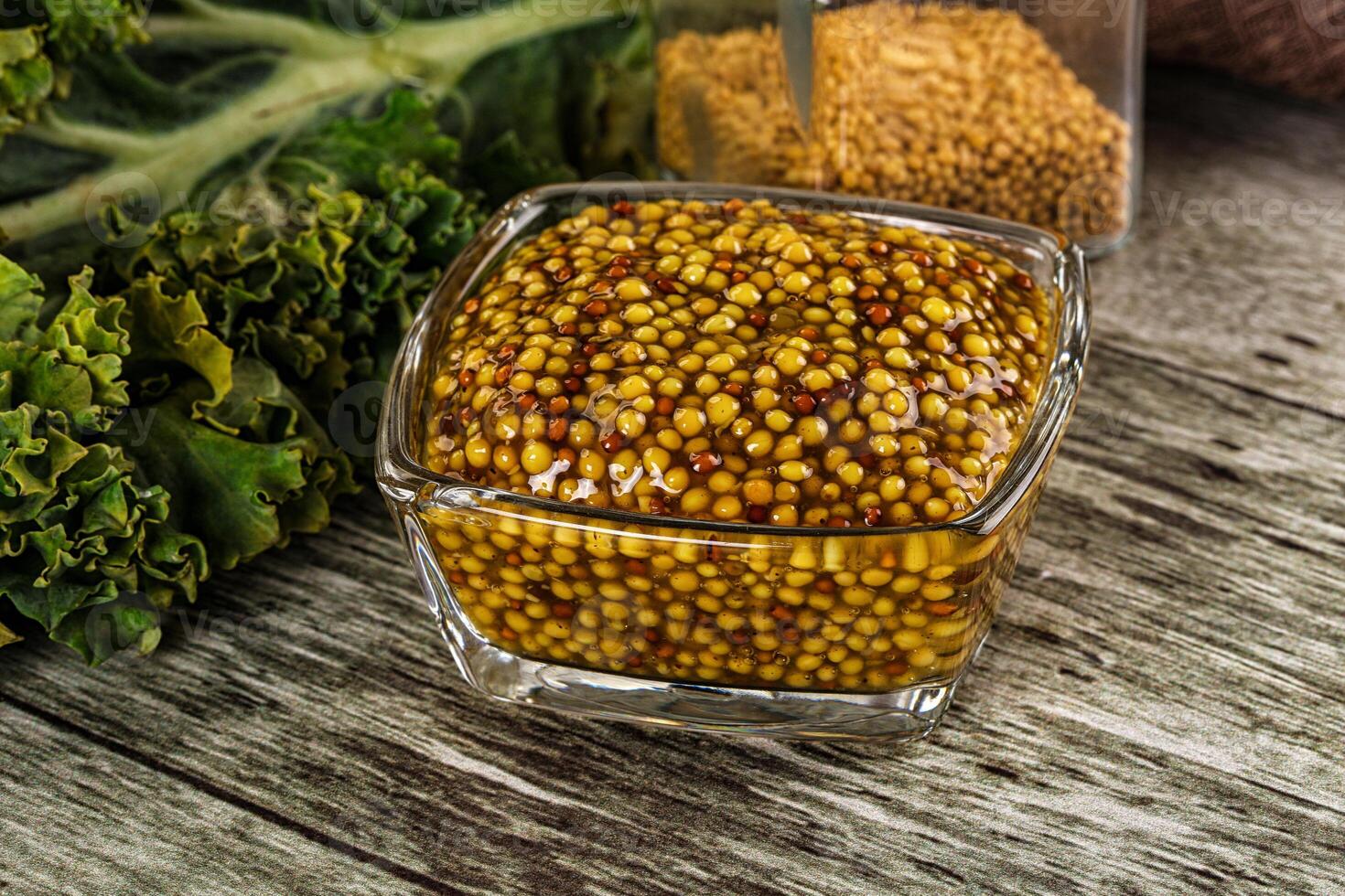 Mustard sauce with seeds in the bowl photo