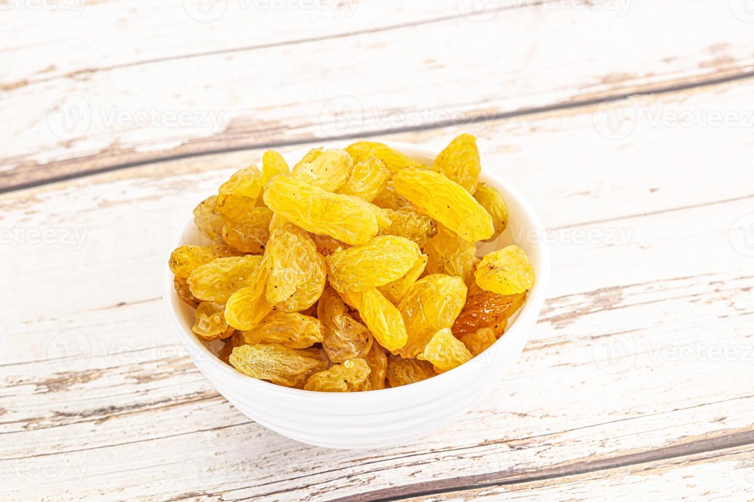 Yellow raisin - dry grape berries photo