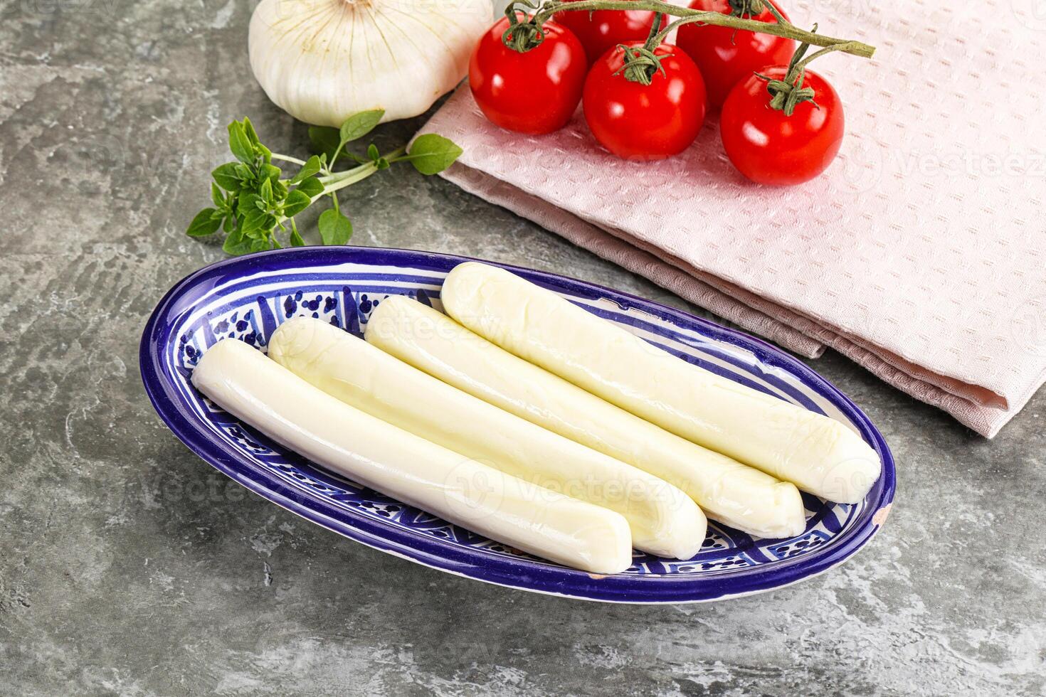 Mozzarella cheese stick heap snack photo