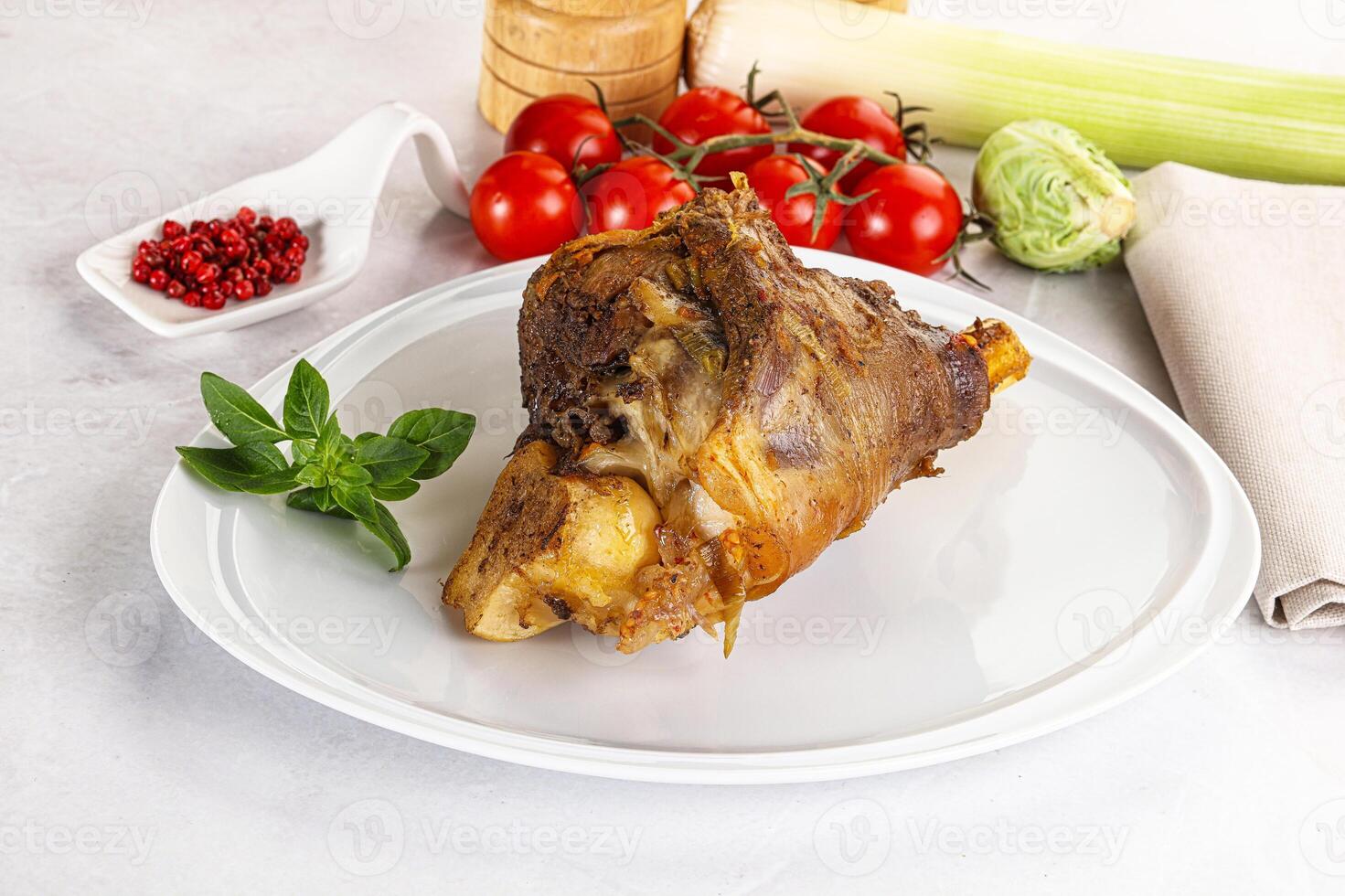 Baked Lamb shank with bone photo