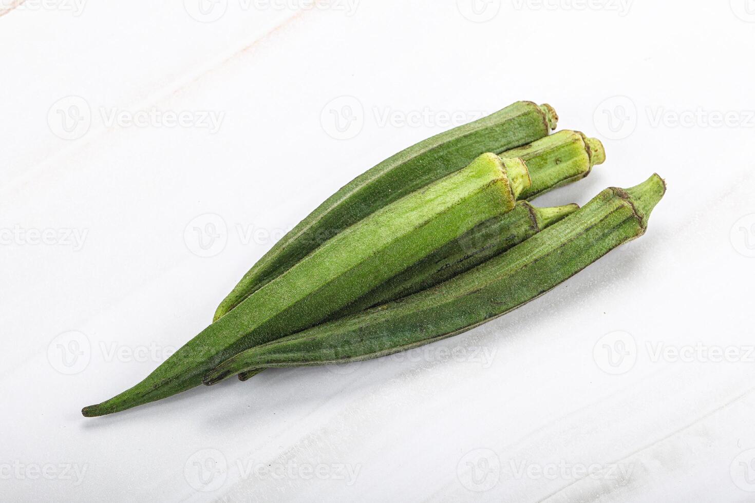 Green ripe tasty okra tropical vegetable photo