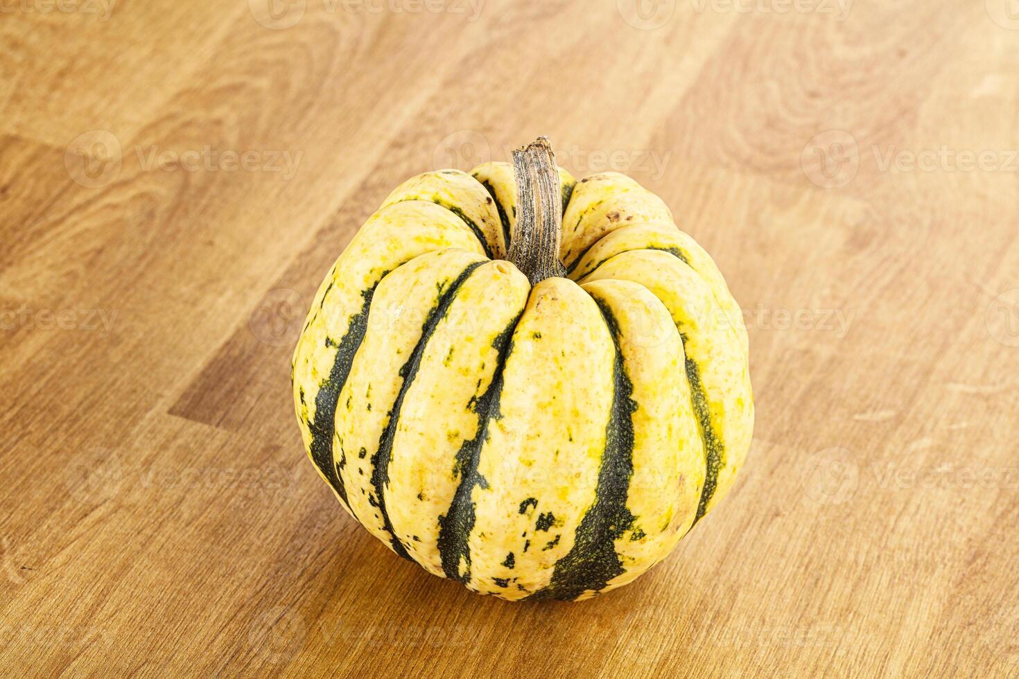 Ripe raw fresh decorative pumpkin photo