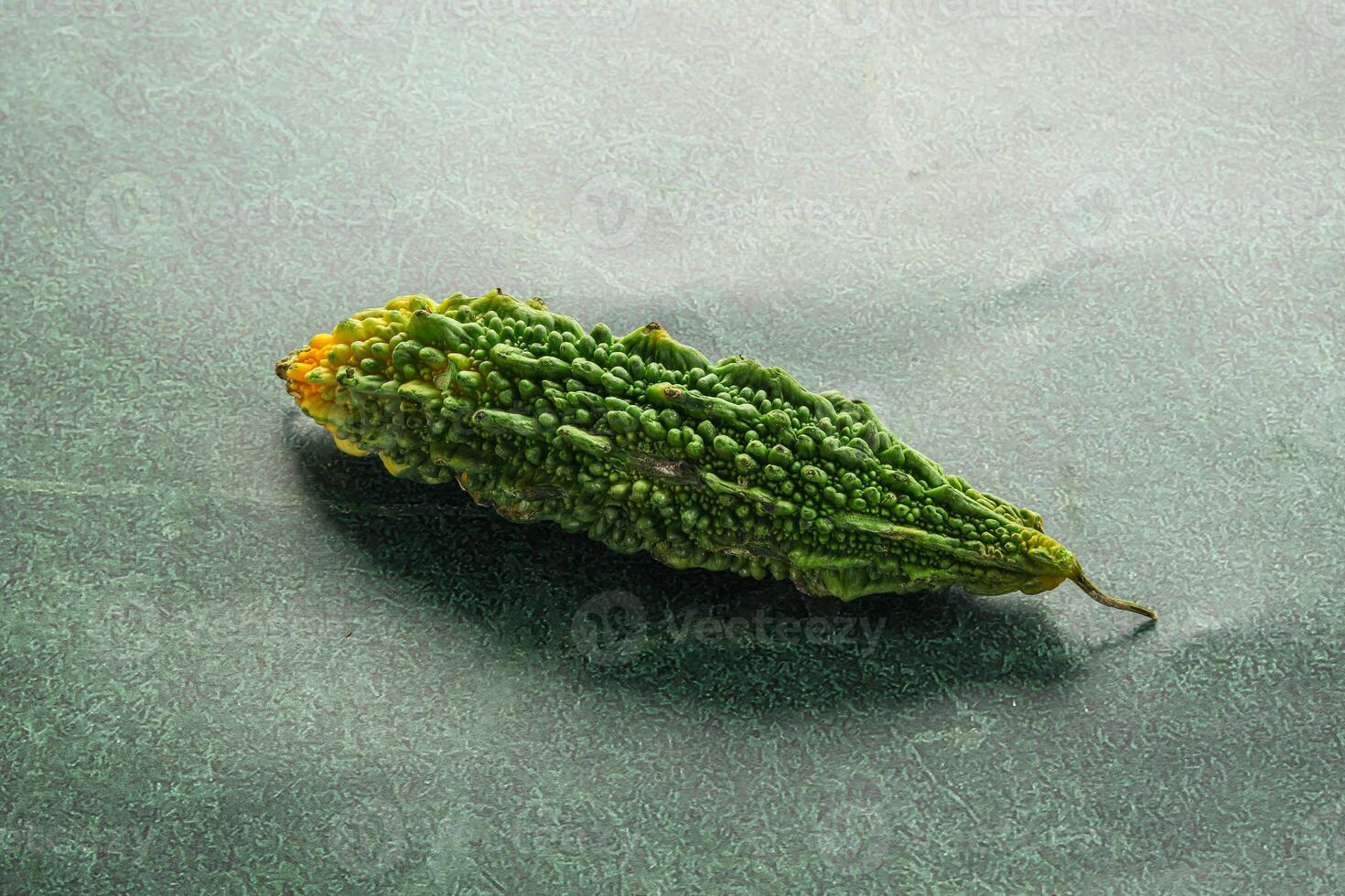 Raw green exotic tropical bitter melon photo
