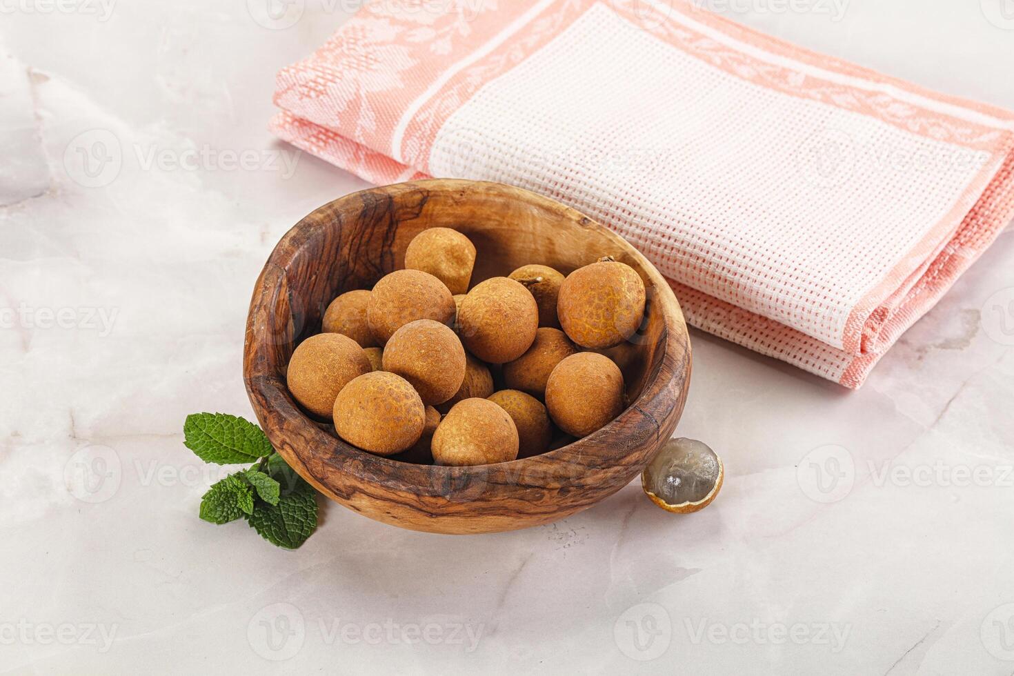 Tropical delicous fruit Longan heap photo