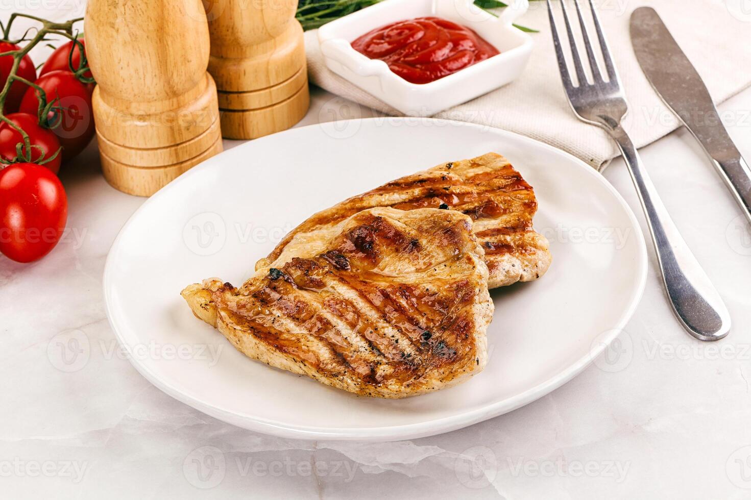 Grilled pork steak with sauce photo