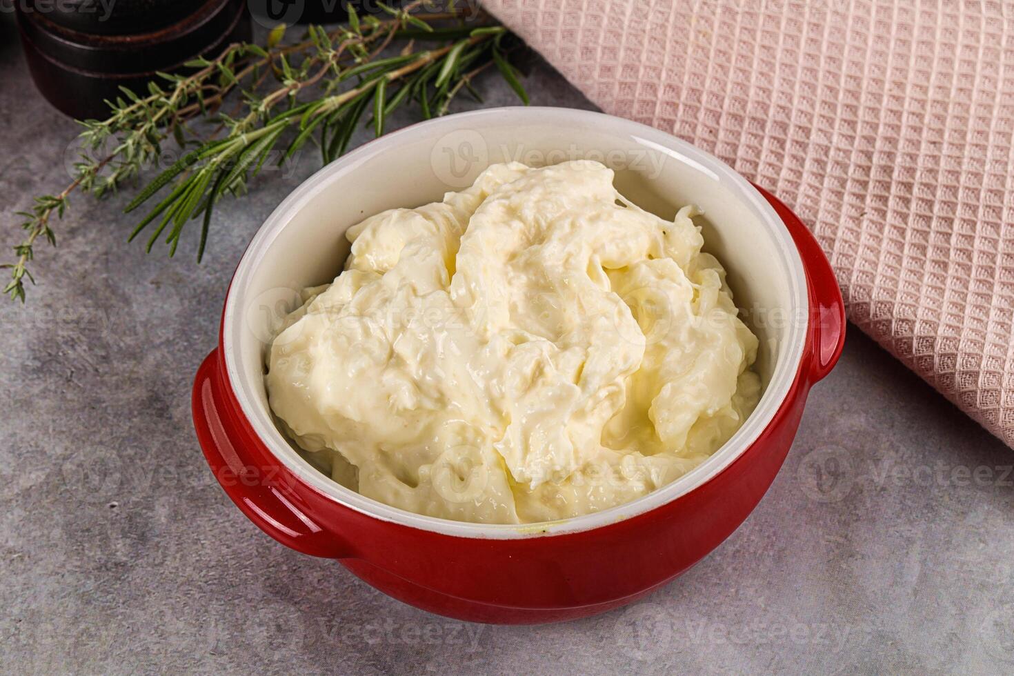 Italian soft young cheese stracciatella photo