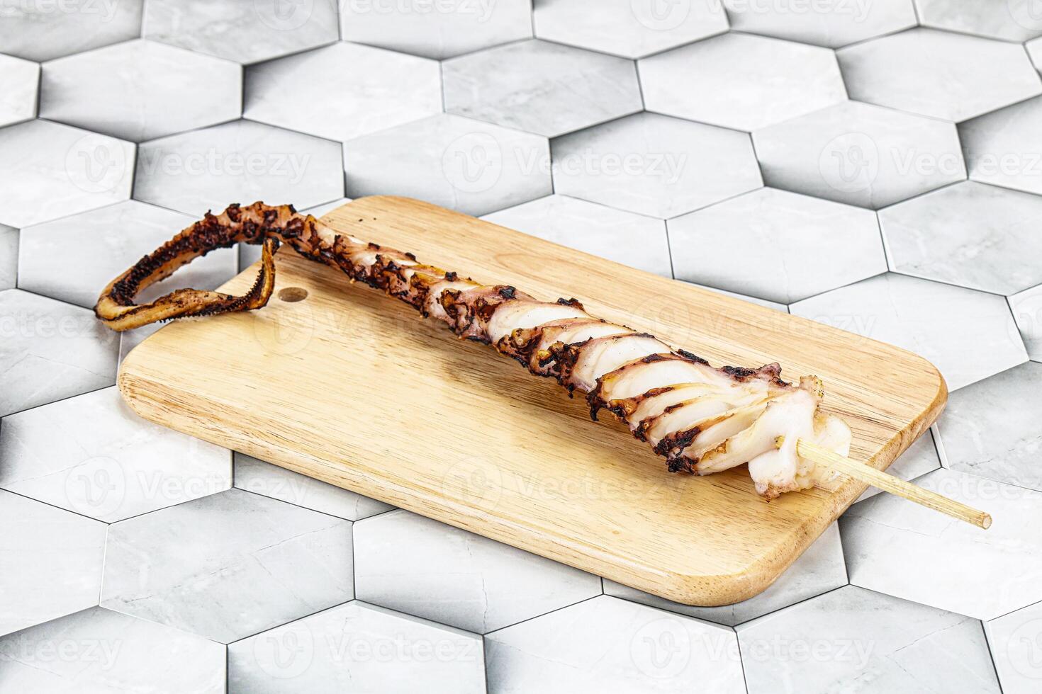 Delicous tasty Grilled octopus tentacle photo