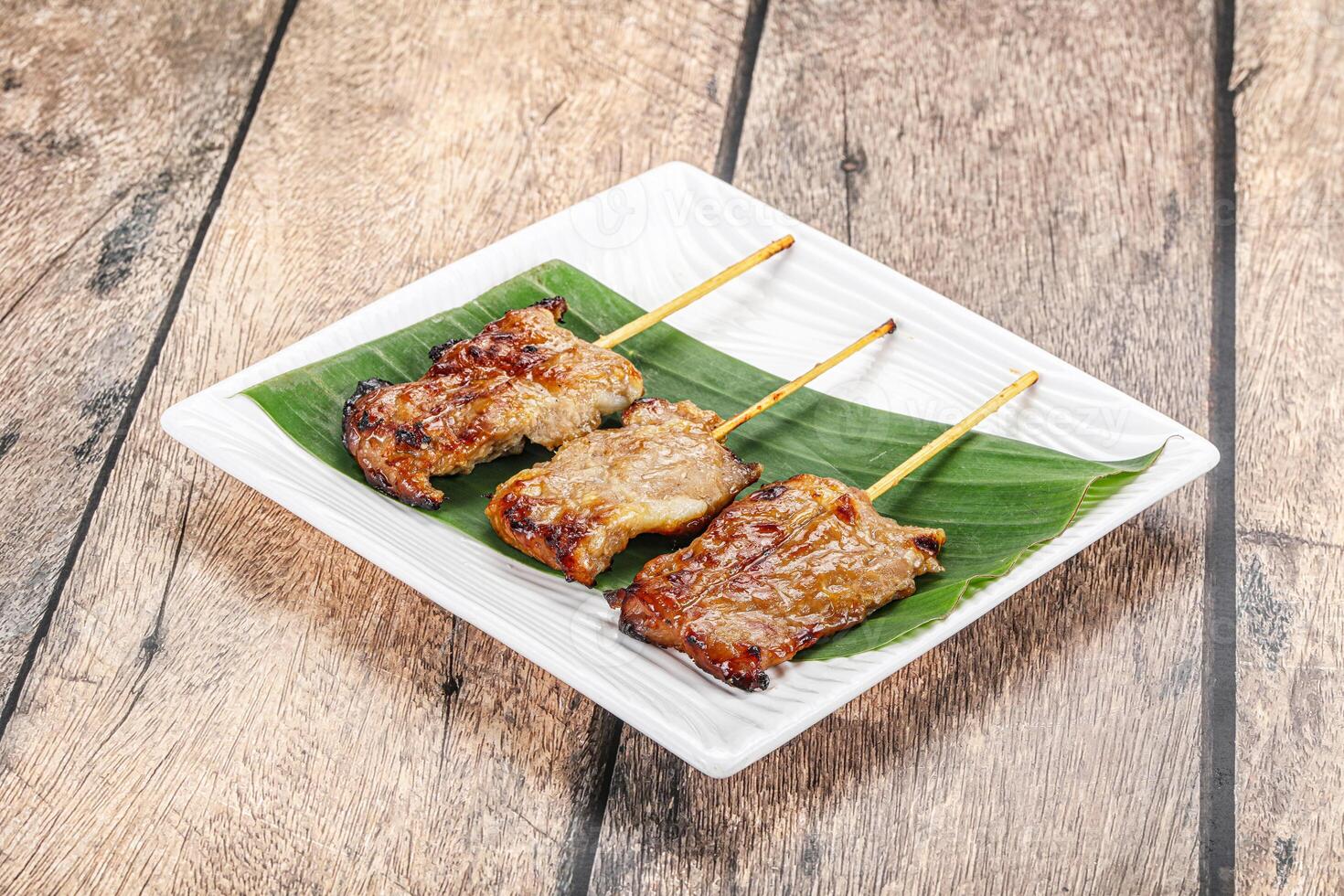 Thai cuisine - grilled pork skewer photo