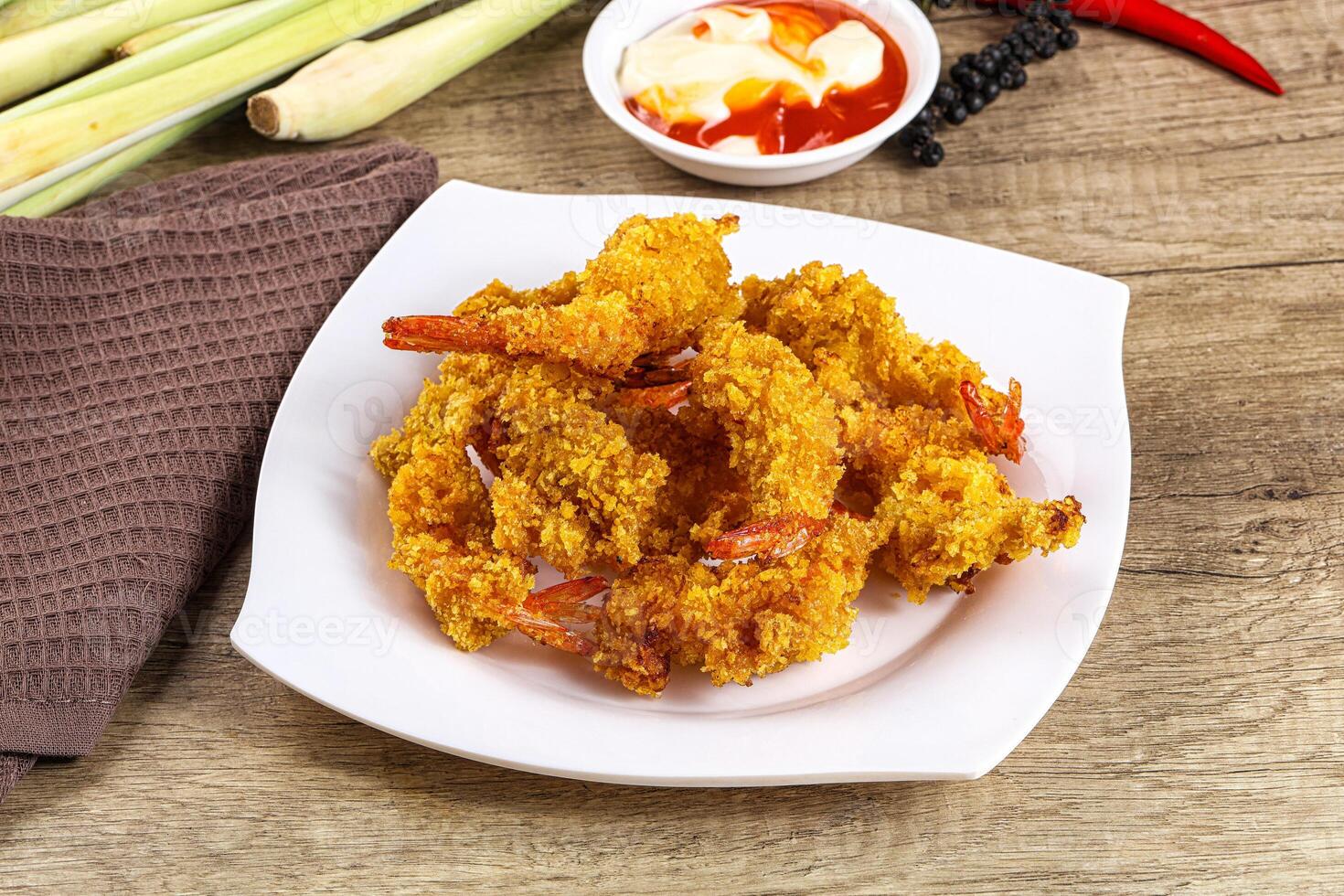 Golden deep prawn tempura wuth sauce photo
