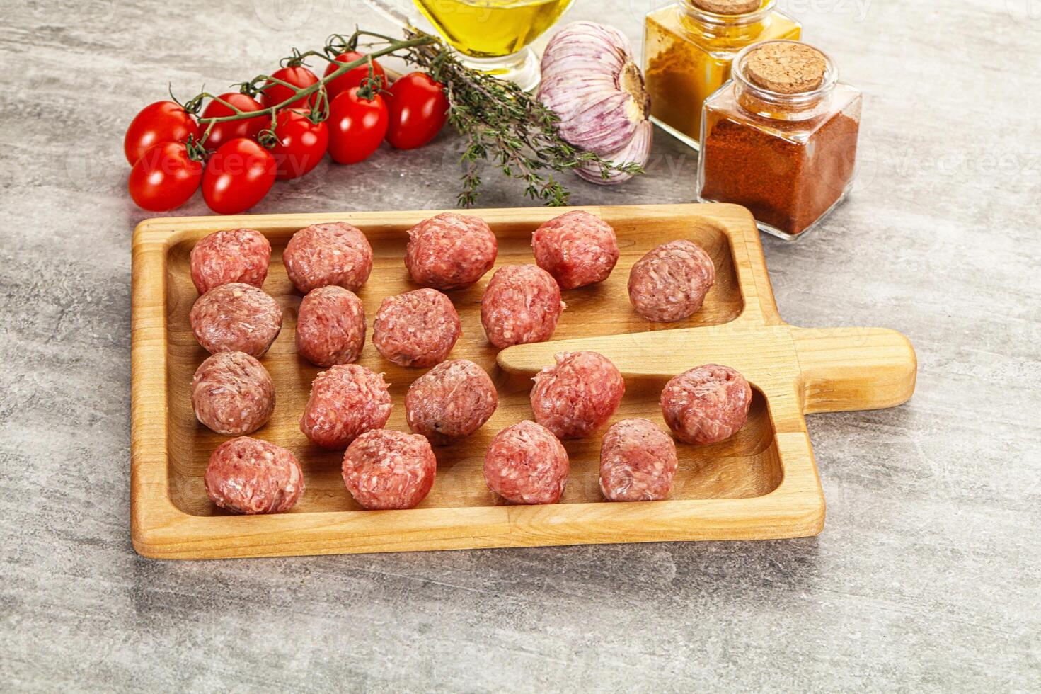 Uncooked raw beef meatball minced photo