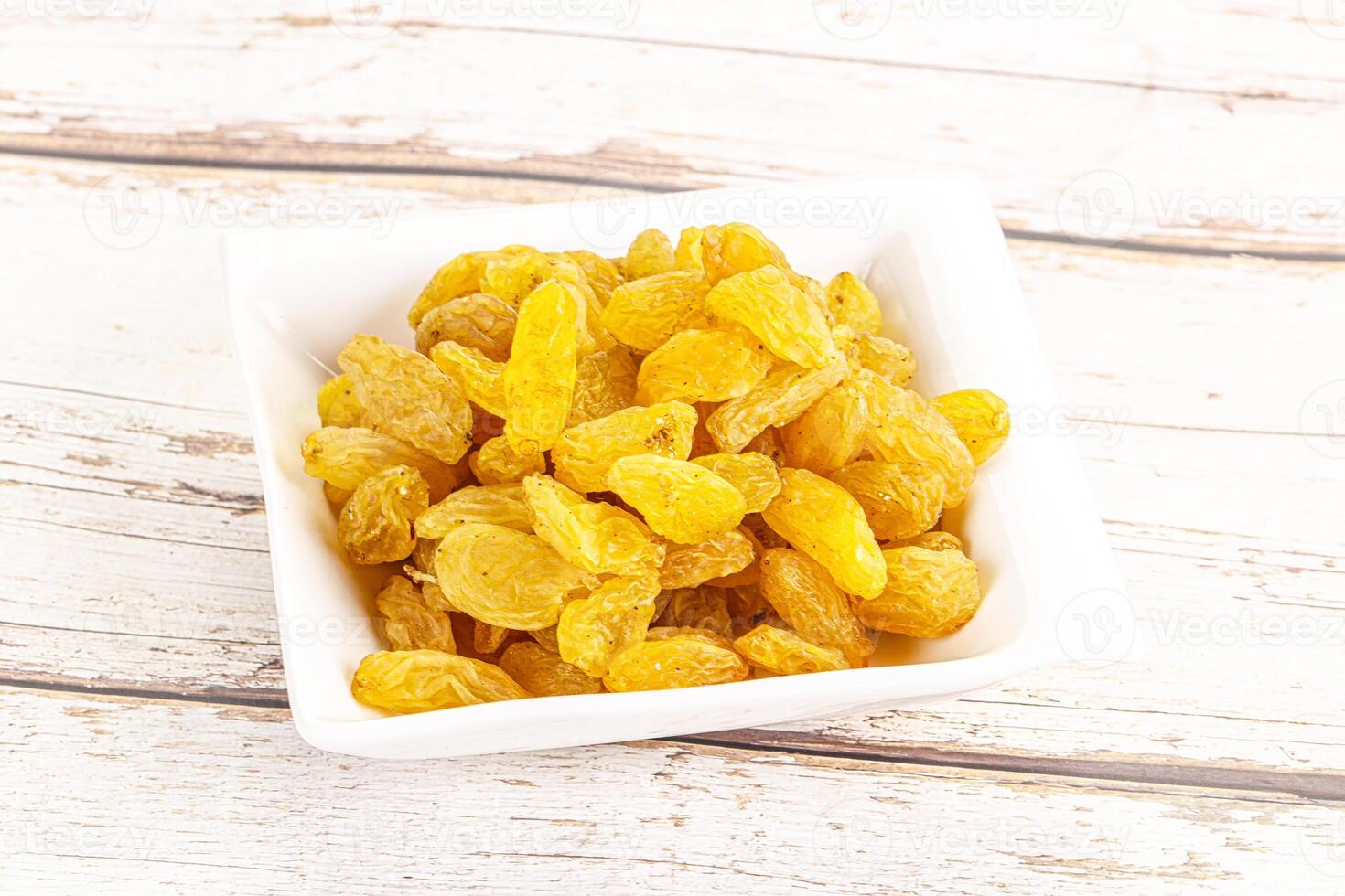 Yellow raisin - dry grape berries photo