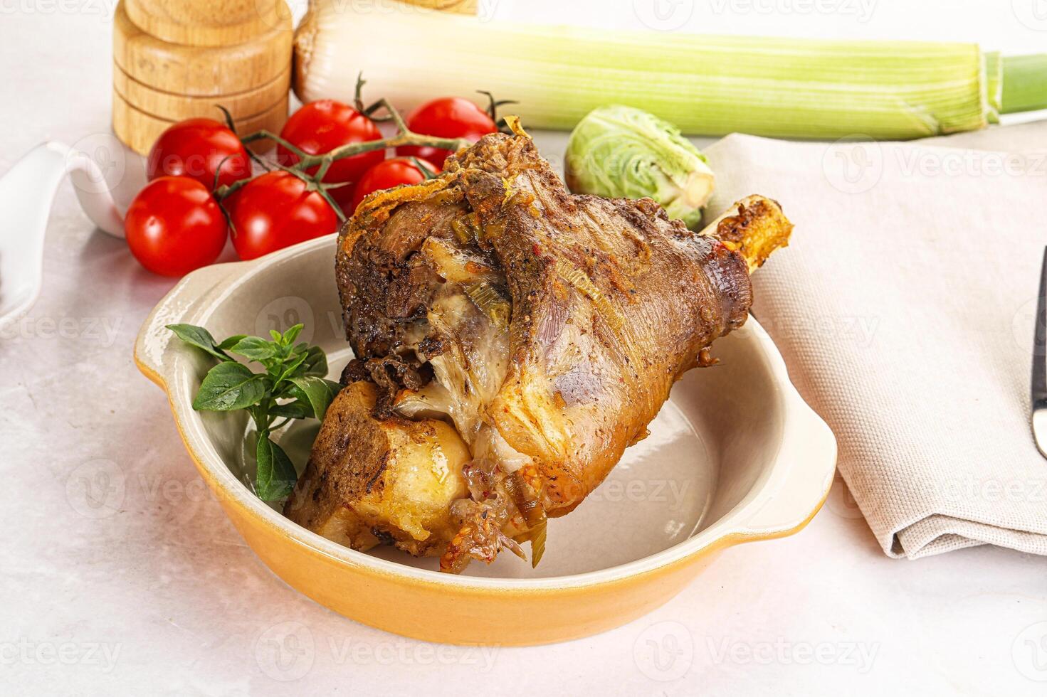 Baked Lamb shank with bone photo