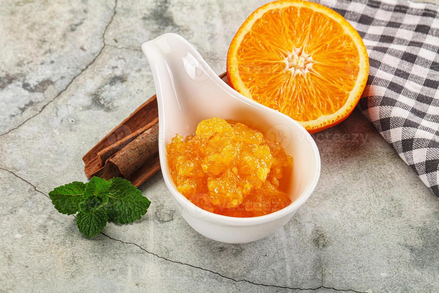 Tasty homemade Orange jam in the bowl photo