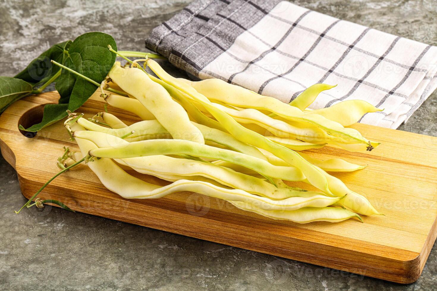 Raw green bean strings heap photo
