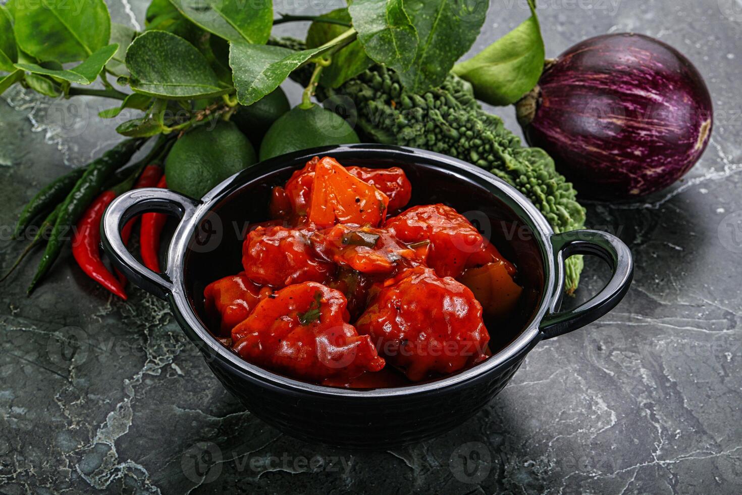 Chinese cuisine - chicken in sweet and sour sauce photo