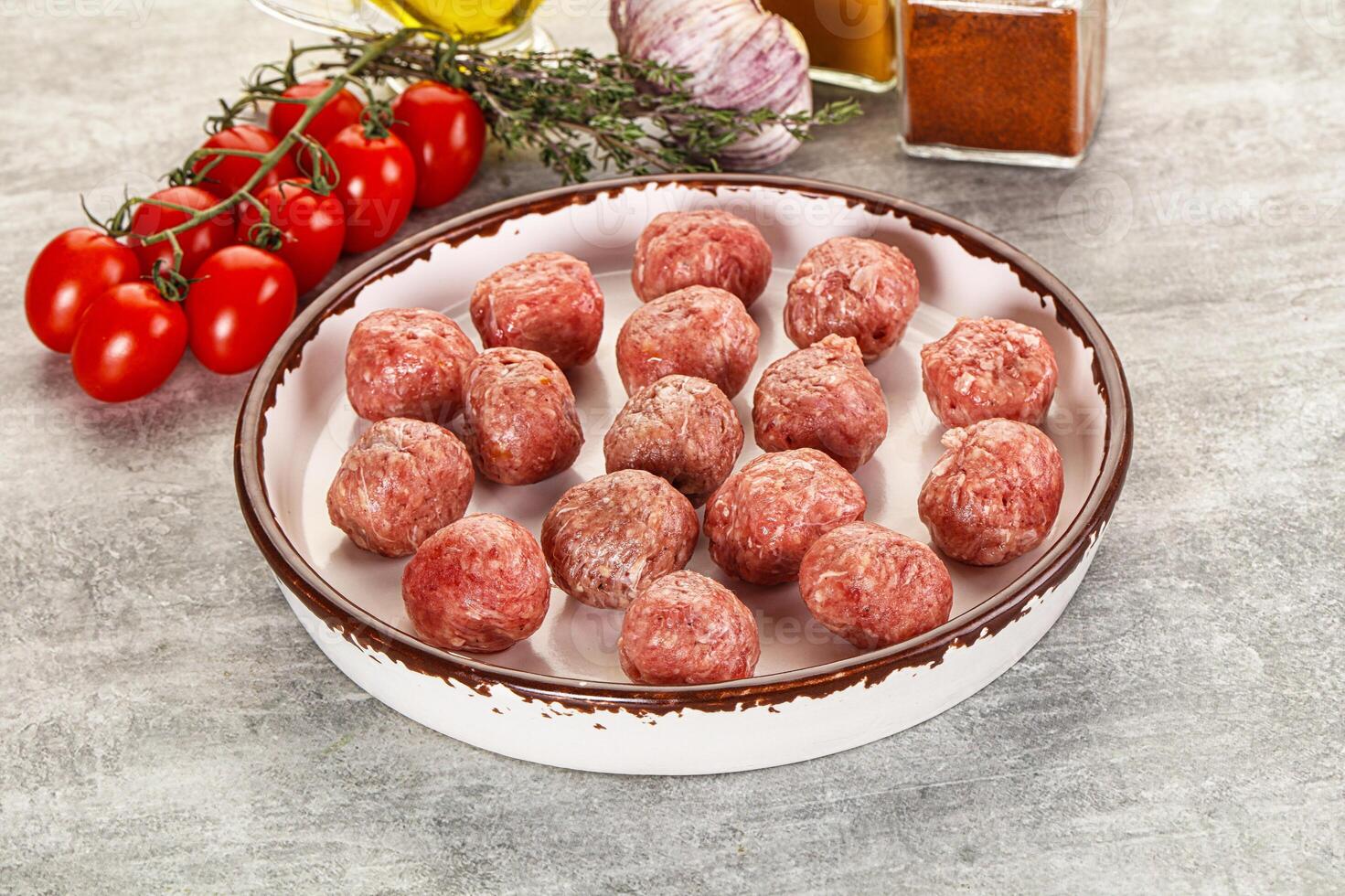 Uncooked raw beef meatball minced photo