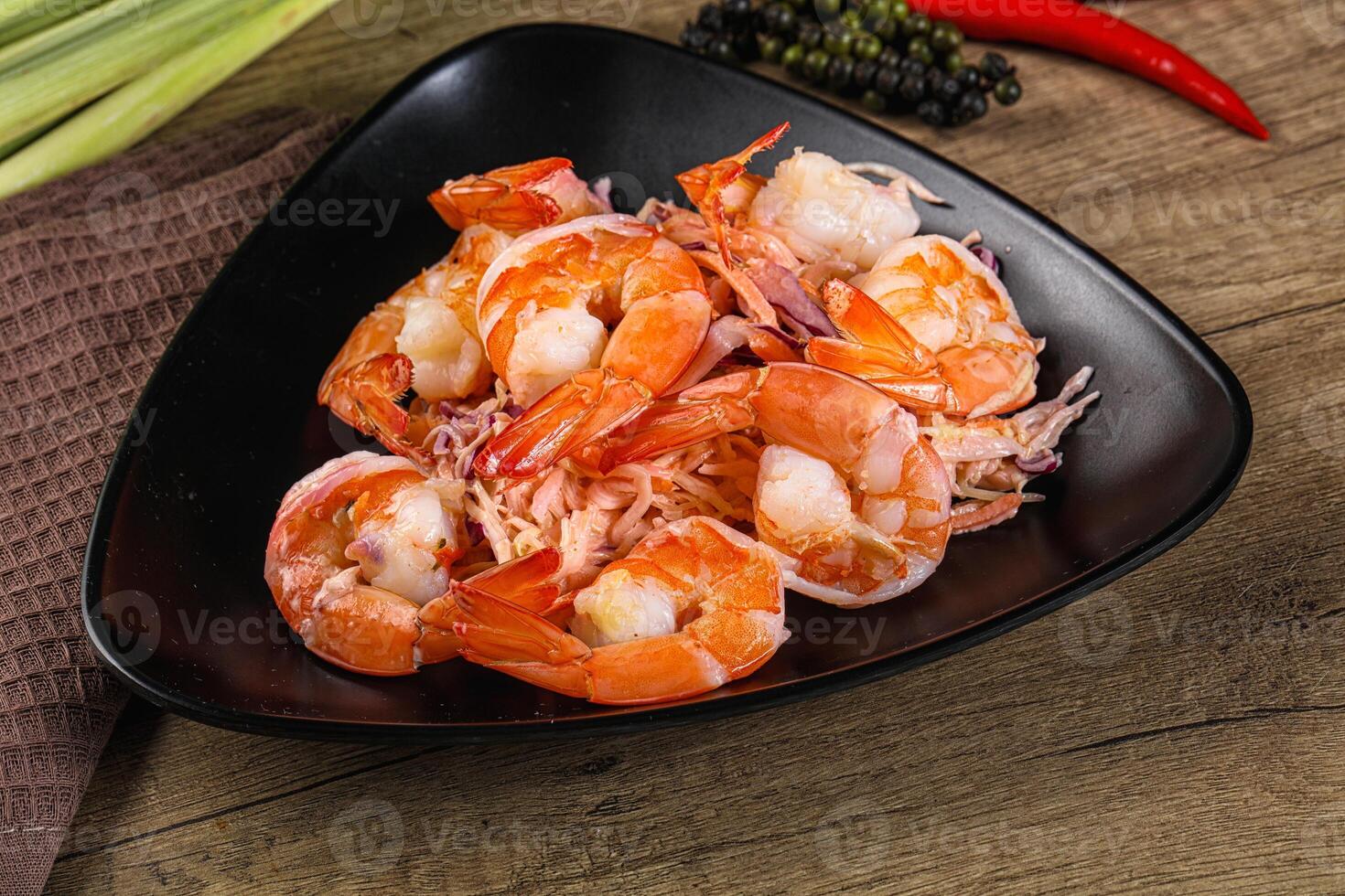 Shrimp cocktail with salad and sauce photo